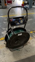 1 akkukäyttöinen kiristyslaite Orgapack OR-T 250 akulla ja kelausvaunulla